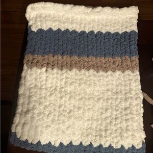 Hand knitting chenille throw .